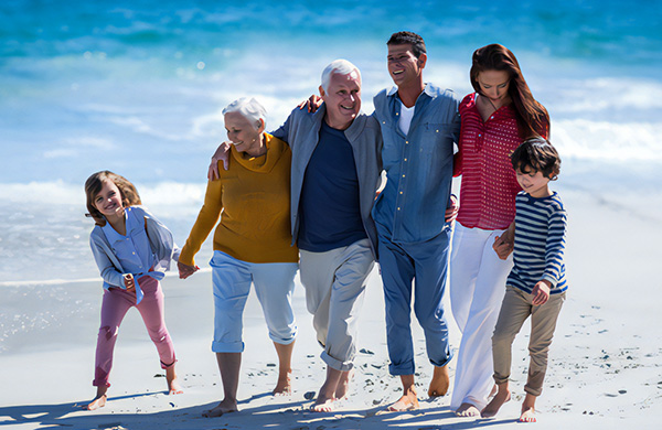 Family walking on the beach