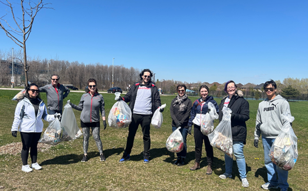 SECL employees with collected waste during the Earth Day park cleanup Phot